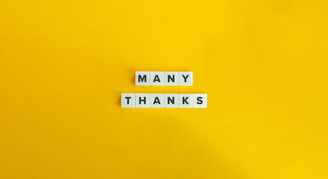Many thanks Phrase on Block Letter Tiles on Yellow Background. Minimal Aesthetic.