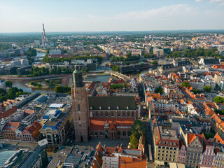 Fototapeta na wymiar Wroclaw, a city in the Lower Silesian Voivodeship on a sunny day. The most visible tourist places and locations in Wrocław from a bird's eye view from a drone.