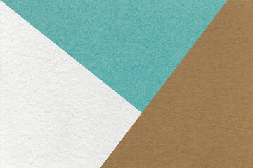 Texture of craft white, brown and turquoise shade color paper background, macro. Vintage abstract cyan cardboard