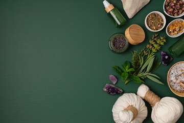 Fototapeta Botanical blends, herbs, essencial oils for naturopathy. Natural remedy, herbal medicine, blends for bath and tea on green background obraz