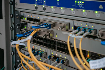 Modern switching equipment is in the server room of the Internet data center. The main fiber optic...