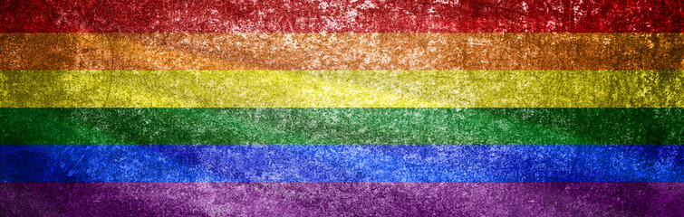 Grunge LGBT flag. Dirty LGBT flag on a metal surface. Banner of rainbow flag