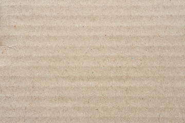 Fototapeta na wymiar Cardboard texture. Brown cardboard background. Empty carton with surface texture. Brown cardboard sheet of paper