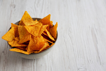 Mexican Chili Tortilla Chips in a Bowl, side view. Copy space.