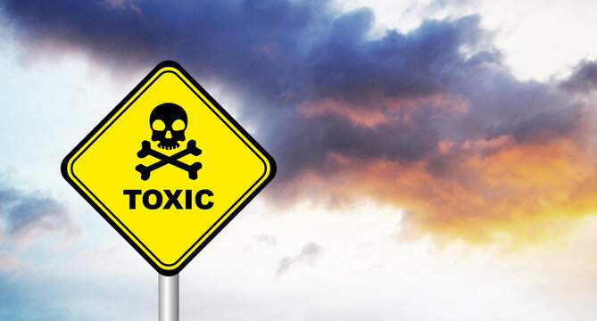 toxic sign on sky background