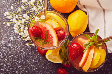 Aesthetic summer fresh cocktails with fruits. Low alcohol, zero proof drinks. Trendy shadows and sunlight, natural light. Flat lay