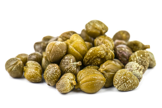 Heap of delicious capers on white background