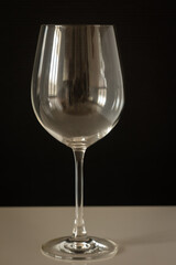 close-up of a beer glass on a dark background vertical photo