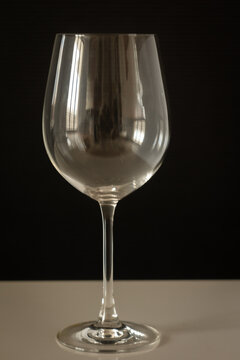 close-up of a beer glass on a dark background vertical photo