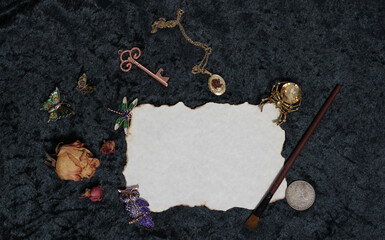 Paint Brush on Old Paper With Dried Flowers and Locket