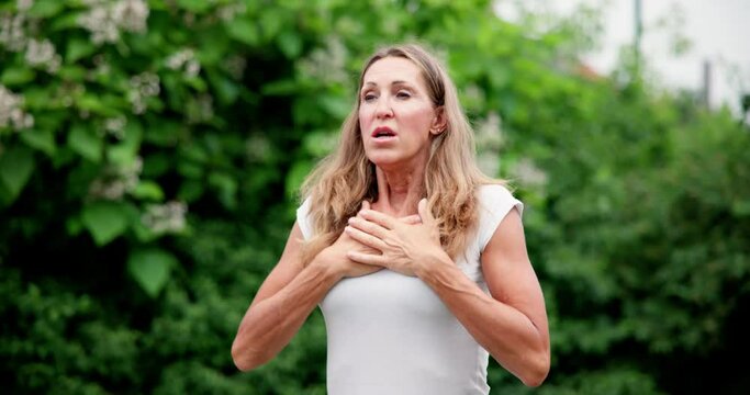 Woman Heimlich Maneuver. Illness Pain
