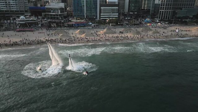 Aerial view of Fly Board, Jet Ski show at haeundae, Busan, South Korea