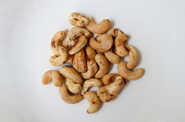 Brazilian walnut cashew nuts on white background