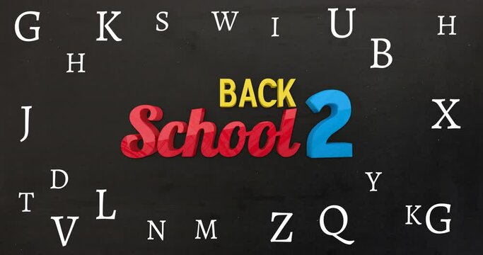 Animation of back to school text over letters on black background