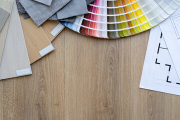 Color palette guide catalog with colour swatches. Wooden flooring and furniture material samples. Home floor plans, building blueprint projects. Architect or interior design flat lay with copy space.