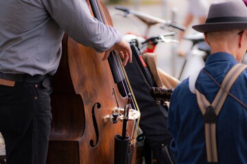 Jazz musicians on the street, a contrabass violin.