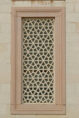 window with islamic pattern in a mosque