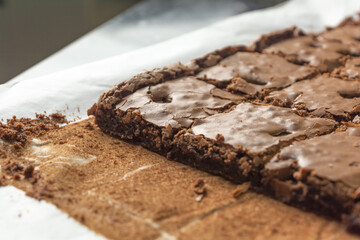 homemade brownies cut in square pieces. chocolate brownies made at home