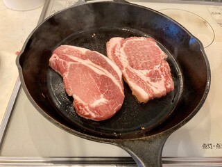 Pork on a skillet.