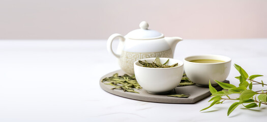 Asian tea utensils for traditional tea ceremony. Green tea leaves. Teapot and white cup ceramic isolated on a light flat background with copy space. Banner template. Generative AI photo.