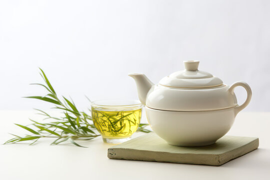 Asian tea utensils for the traditional tea ceremony. Green tea leaves. Teapot and cup ceramic isolated on a light flat background with copy space for text. Banner template. Generative AI photo.