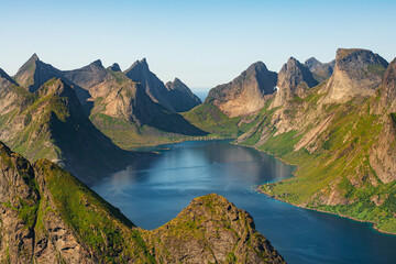 View of a fjord Kjerkfjorden near village Reine from Reinebringen with dramatic mountains and peaks and sea, Lofoten islands, Nordland, Norway. One of the most beautiful view of Lofoten islands.