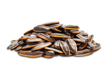 Side view pile of salted sunflowers seeds isolated on white background with clipping path.