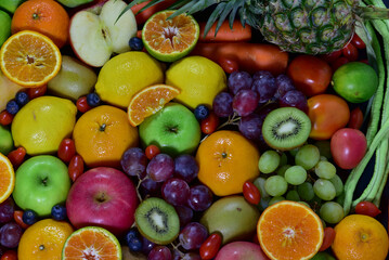Fresh fruits, assorted fruits, colorful background. Healthy fruits and vegetables concept.