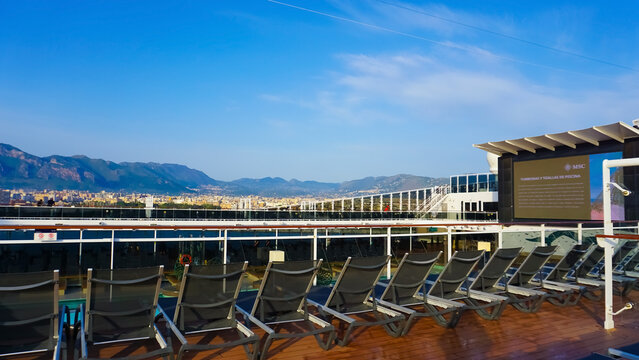 Barcelona, Spain - May 25, 2023: The simming pool area on the cruise ship MSC Grandiosa