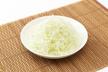 shredded cabbage on white background