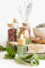 Botanical blends, herbs, essencial oils for naturopathy. Natural remedy, herbal medicine, blends for bath and tea on wooden table background