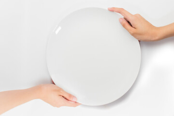 Two Hand Holding a Plate