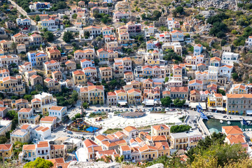 Fototapeta premium High View of Village Below Including roads and Part of the Harbor from Symi Castle in Greece