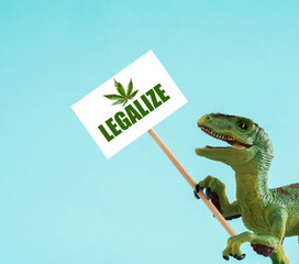 Cute dinosaur holding banner with legalize inscription on blue background.