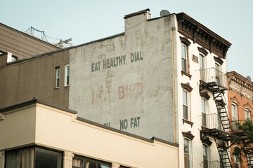 Hand-painted ghost sign in Cobble Hill, Brooklyn, New York