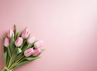 Beautiful bouquet of pink tulips flowers on pastel pink background