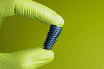 implant on green background ,