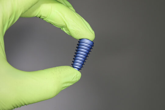 implant on green background ,