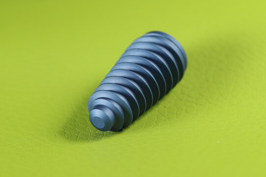 implant on green background ,