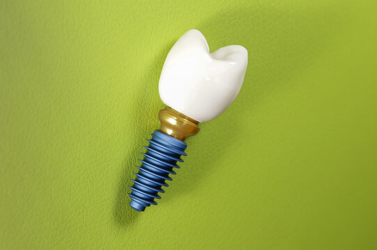 implant on green background ,