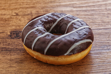Glazed sweet tasty chocolate donut