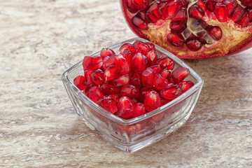 Ripe red Pomegranate seeds in the bowl