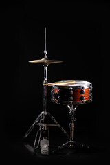 Fototapeta na wymiar Drum Set On A Stage At Dark Background. Musical Drums Kit On Stage. Vintage look with smoke effect