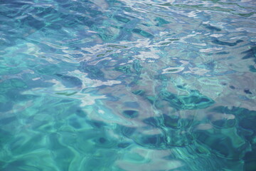 Fototapeta na wymiar Turquoise Aquamarina crystal clear sea water texture
