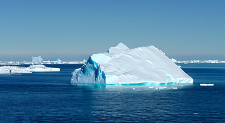 big iceberg and ice mountains in antarctica in high resolution © Marco