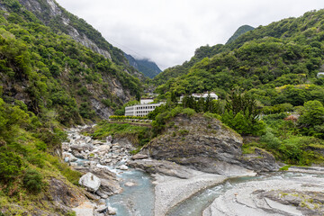 Fototapeta na wymiar Liwu river gorge and high mountain cliff face in taroko national park