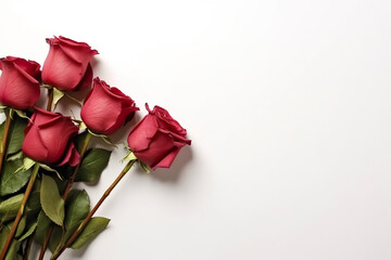 A bunch of red roses sitting on top of a white surface. Generative AI.