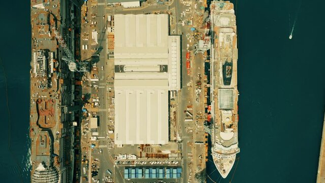 Aerial overhead shot of two modern cruise ships being built in the shipyard in Monfalcone, Italy