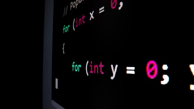 Closeup macro shot movement of coding script moving across LED screen with real-time AI-generated typing, showcasing advanced AI learning in optimization, debug and coding for software development.