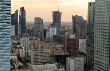 Obraz na płótnie Canvas Panoramic view of modern skyscrapers and business centers in Warsaw. View of the city center from above. Warsaw, Poland.